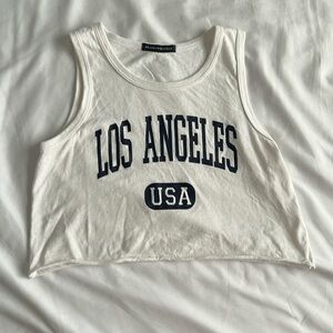 Brandy Melville cropped white tank that says Los Angeles.